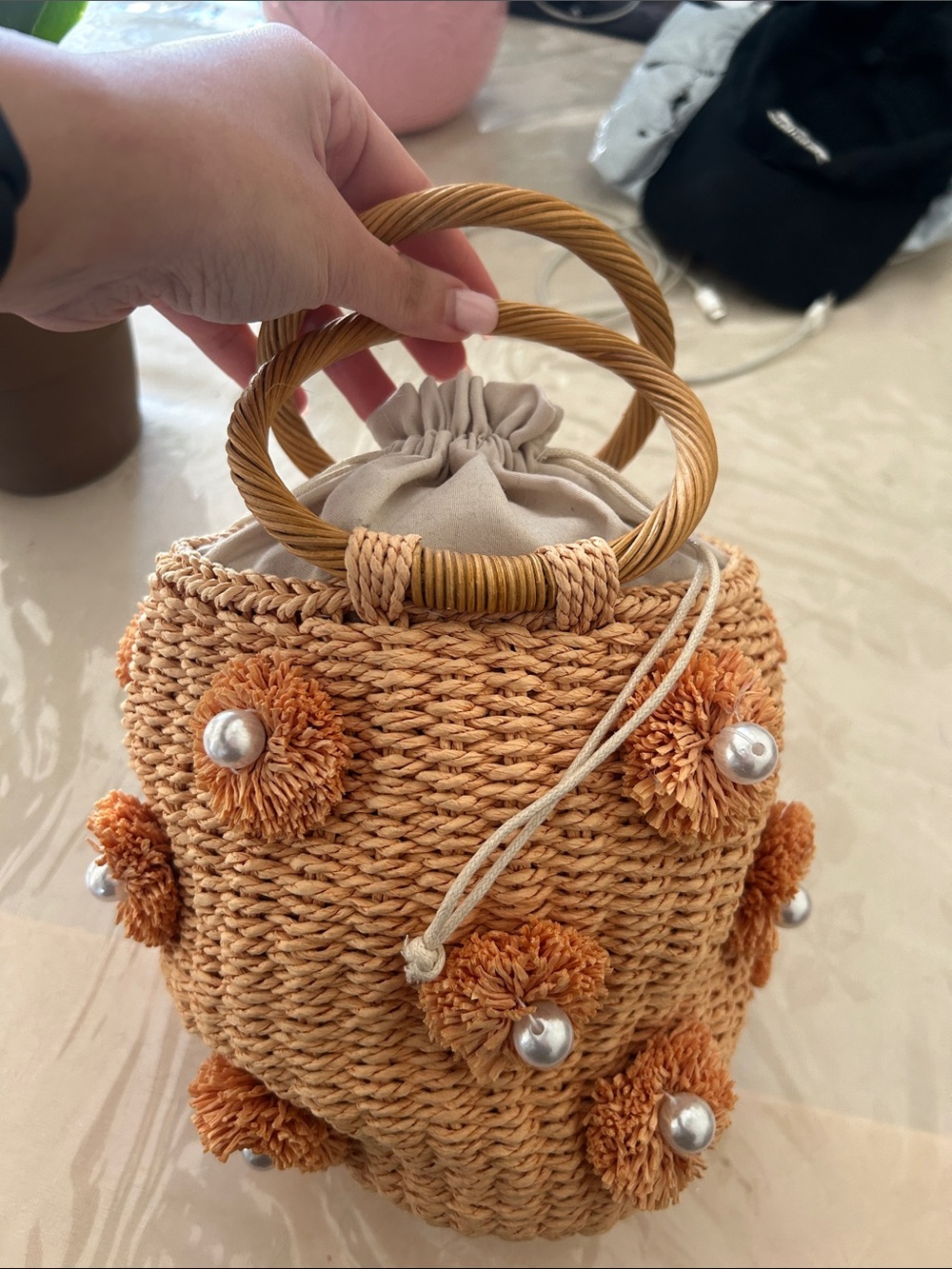 Woven Pom-Pom Straw Bucket Bag with Pearl Accents - Tan